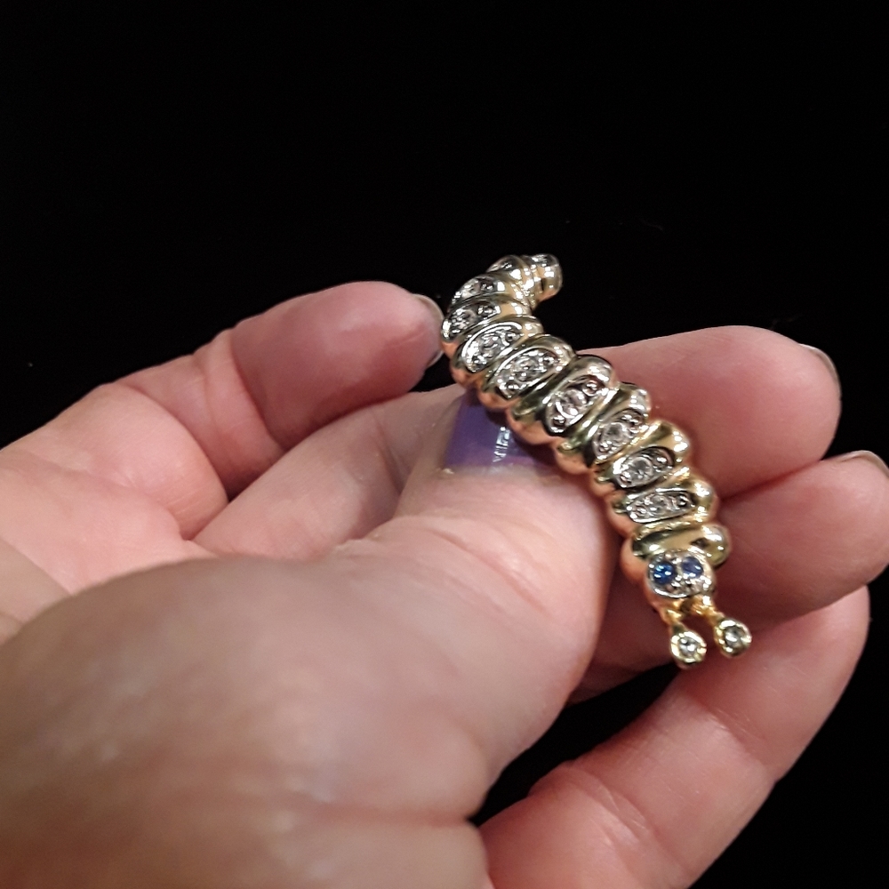 Goldtone and rhinestone inch worm brooch